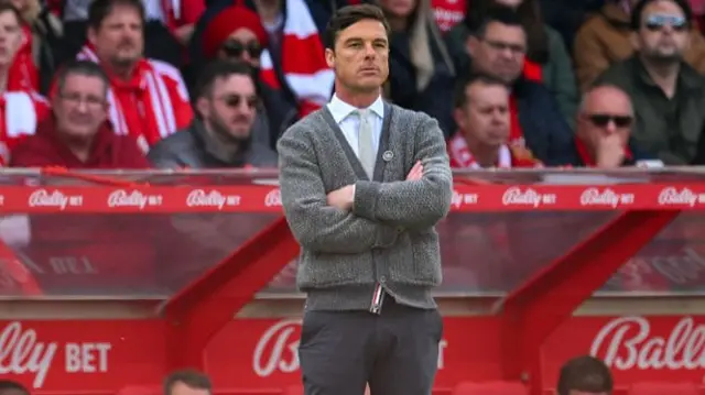 Scott Parker, manager of Burnley, looks on