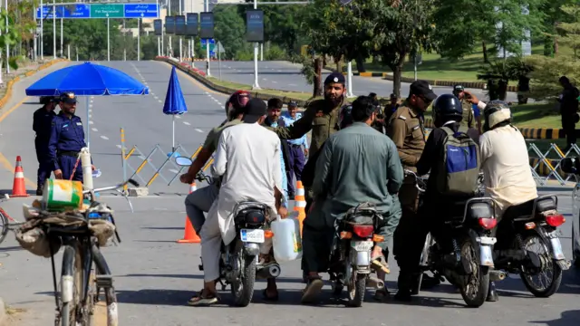 Men on motorbikes on a street