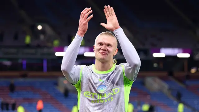 Erling Haaland of Manchester City applauds the fans