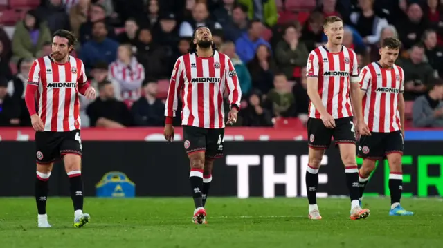 Sheffield United players look dejected