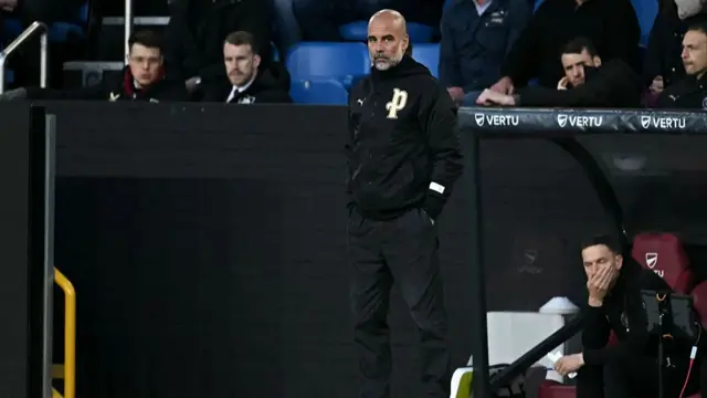 Pep Guardiola on the touchline