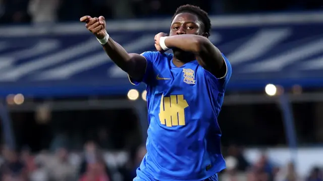 Ibrahim Osman celebrates scoring