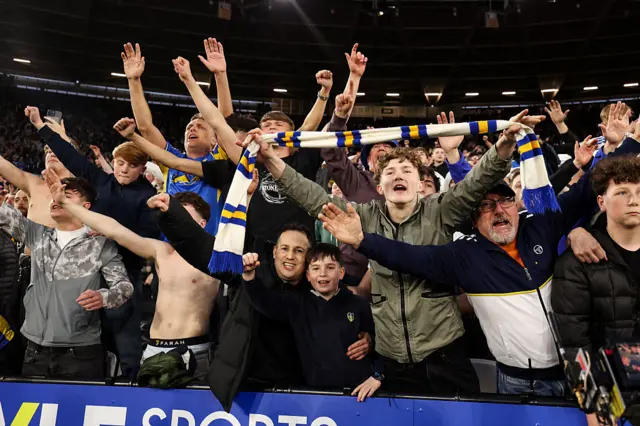 Leeds fans celebrate victory during the Emirates FA Cup Quarter Final