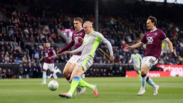 Erling Haaland of Manchester City scores his team's first goal