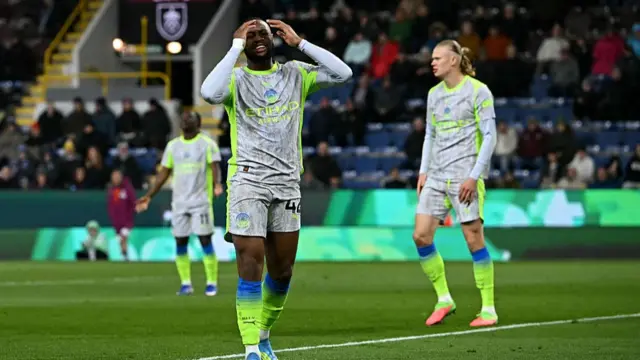 Manchester City's Ghanaian midfielder Antoine Semenyo reacts