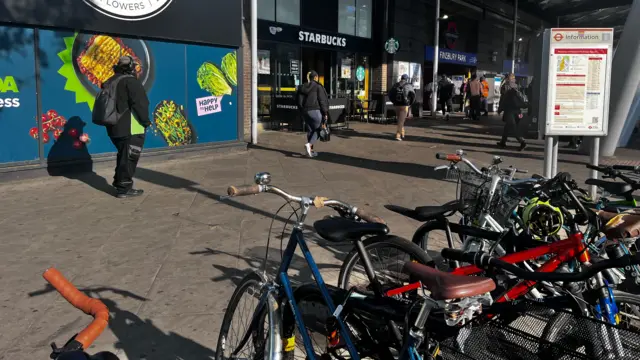 Finsbury park station exterior image, showing also bikes parked outside