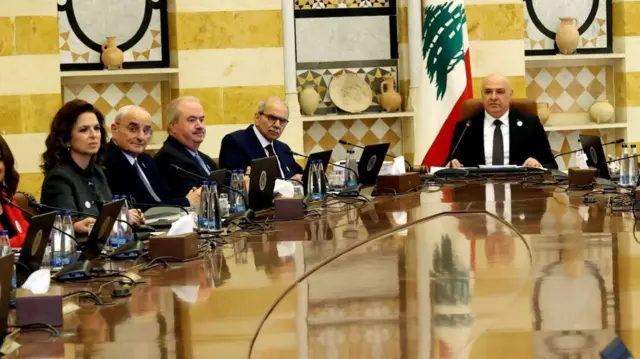 President Aoun sitting at the head of the Labense cabinet table