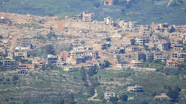 Damaged buildings in Al-Khiyam, southern Lebanon, seen on Thursday