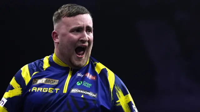Luke Littler celebrates