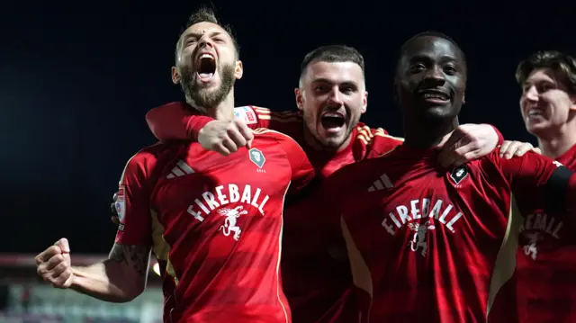 Jorge Grant celebrates scoring in the 2-0 win over Bromley with his team-mates
