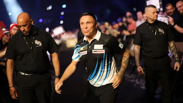 Gerwyn Price walks to the stage