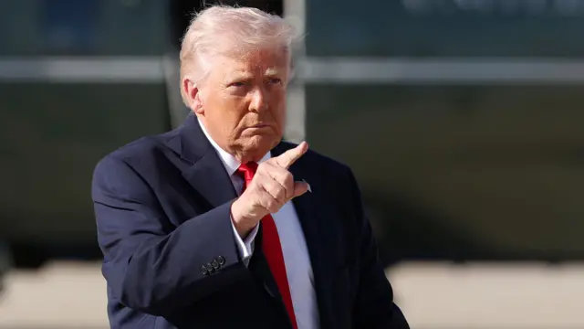 U.S. President Donald Trump walks to Air Force One on April 11, 2026