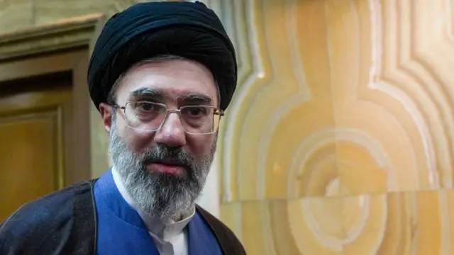 Iran’s new supreme leader, Mojtaba Khamenei wearing dark robes and head dress.