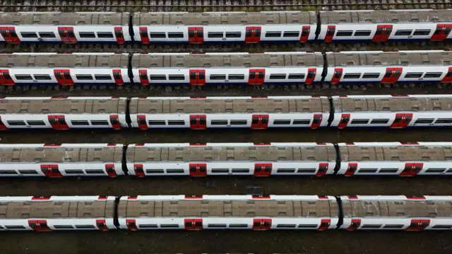 Five Tube trains are seen parked up from a bird's eye view