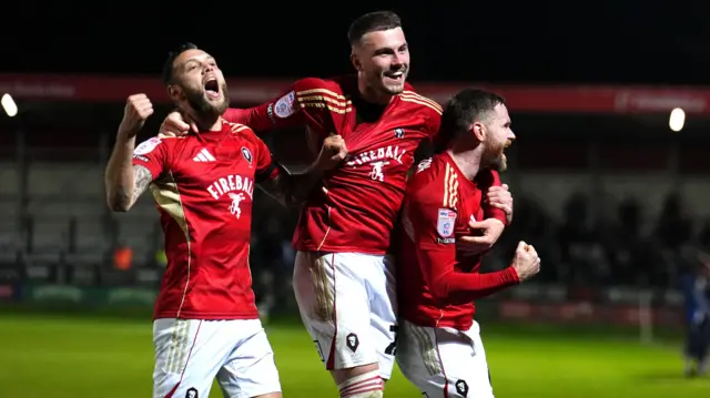 Salford celebrate their second goal in the 2-0 win over Bromley