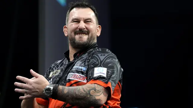 Jonny Clayton celebrates