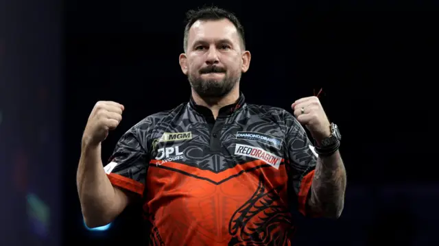 Jonny Clayton celebrates
