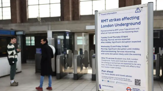 A travel information sign near a Tube barrier displays information about how the RMT strikes are affecting the London Underground