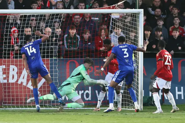 Matthew Young makes a save for Salford