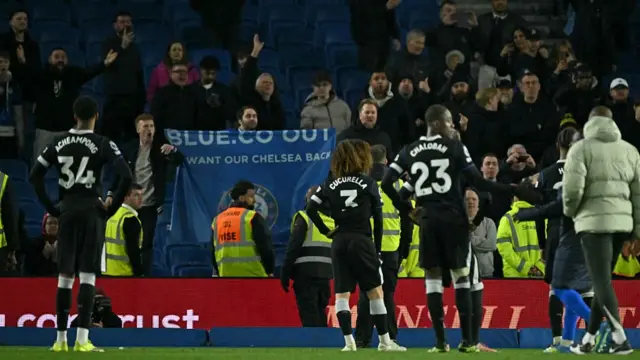 Chelsea players confront supporters following defeat by Brighton