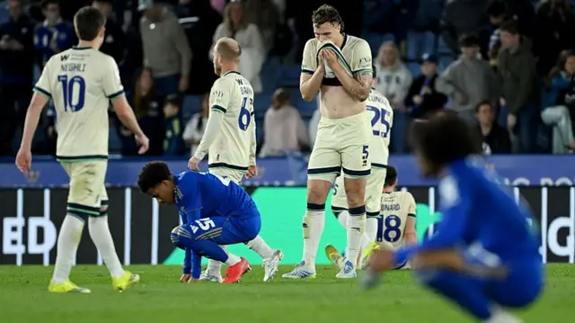 Leicester and Millwall players look dejected at full time