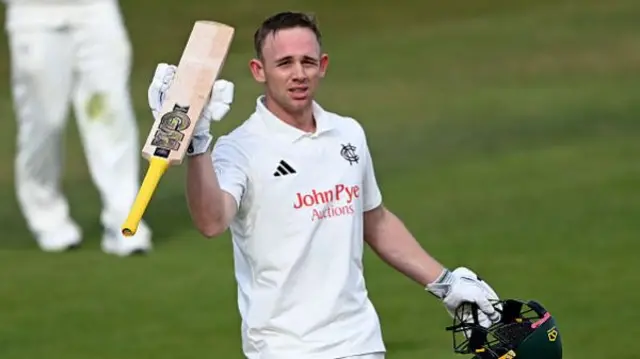 Jack Haynes celebrates his century for Nottinghamshire