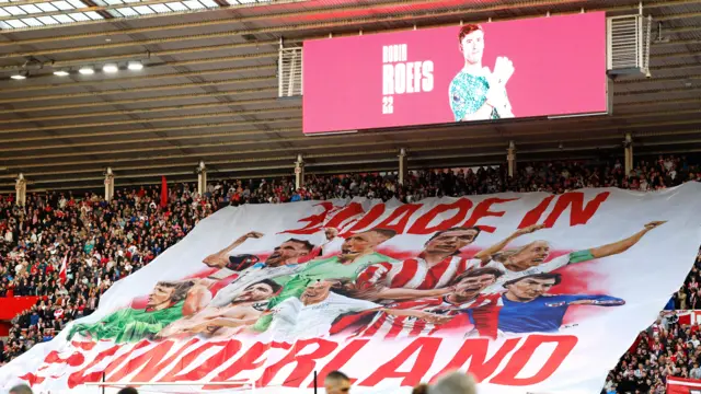 Sunderland fans hold up banner
