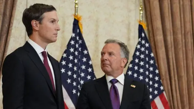 Steve Witkoff and Jared Kushner stand side by side. They both wear dark suits.