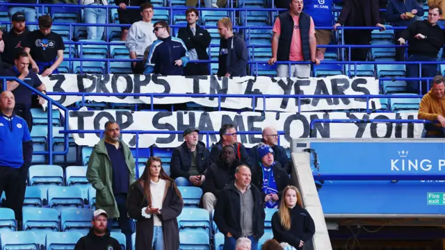 Leicester fans protest at their game against Millwall