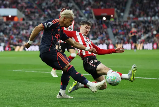 Hutchinson crosses the ball