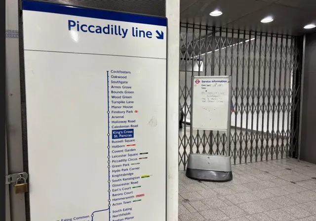 Closed gates to Piccadilly line at King's Cross station