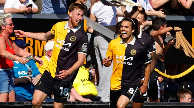 Goal celebrations for Jasper Moon of Burton Albion during the Sky Bet EFL League One Match between Burton Albion and Exeter City