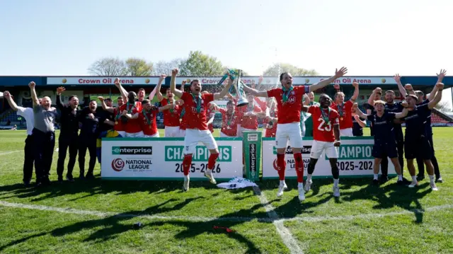 York City players celebrate at Rochdale