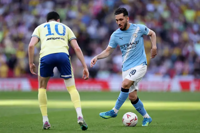 Rayan Cherki of Manchester City controls the ball
