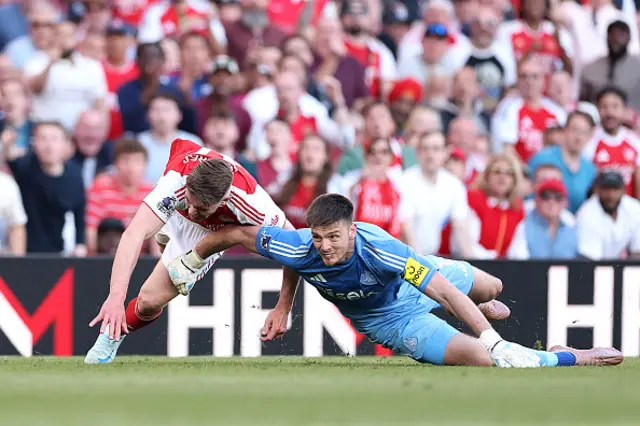 Nick Pope of Newcastle United fouls Viktor Gyoekeres