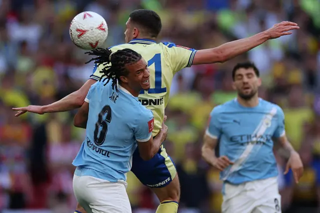 Nathan Ake (L) vies with Southampton's Scottish striker #11 Ross Stewart