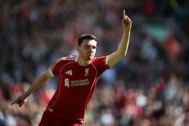 Andrew Robertson celebrates scoring the team's second goal