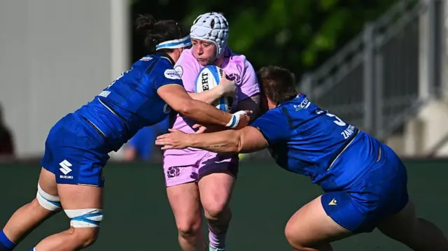 Lana Skeldon in a purple kit with grey scrum cap