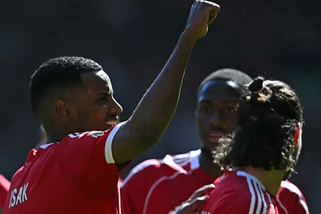 Alexander Isak celebrates scoring the opening goal
