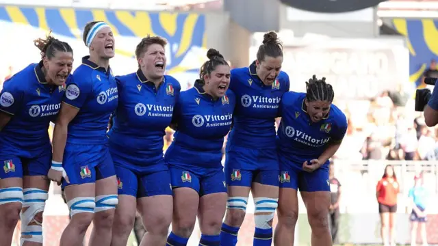 Italy players celebrate their win