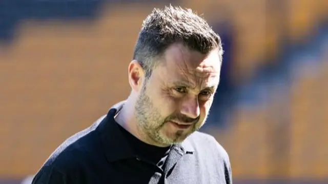 Tottenham Hotspur's manager Roberto De Zerbi looks on