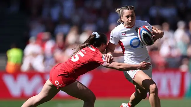 Kayleigh Powell tackles England player Moloney-MacDonald