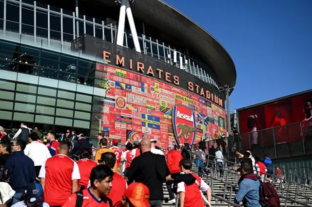 Arsenal fans arrive at the stadium