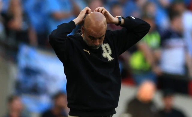 Manchester City manager Pep Guardiola reacts