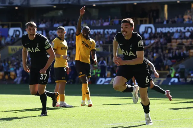 Joao Palhinha (R) celebrates after scoring the opening goal