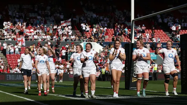 England players celebrate their win