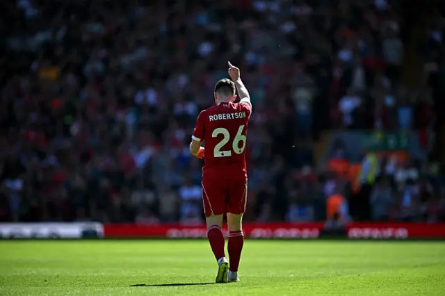 Andrew Robertson celebrates scoring the team's second goal