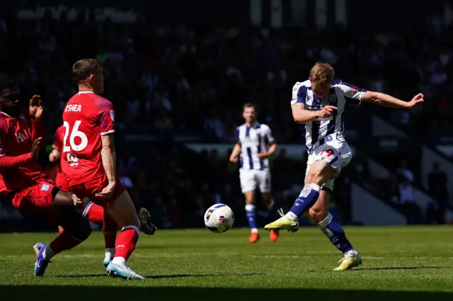 West Brom's Aune Heggebo shoots wide against Ipswich