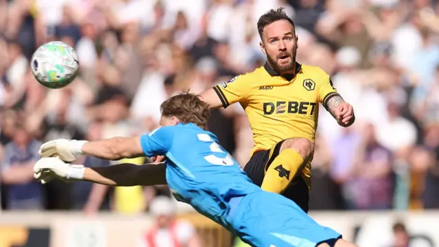 Antonin Kinsky clears a bouncing ball under pressure from Adam Armstrong after Kevin Danso's poor backpass