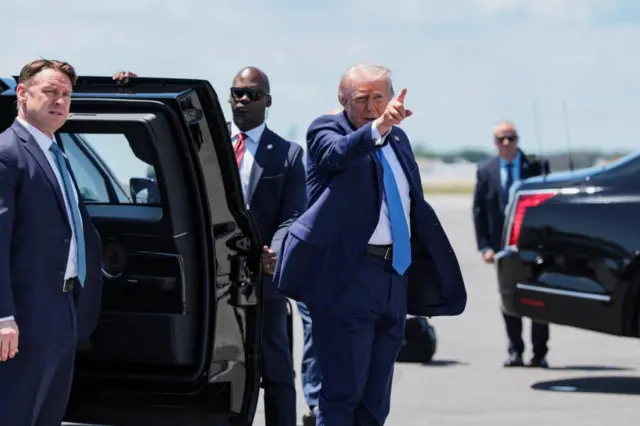 President Donald Trump on the tarmac before getting onto Air Force One